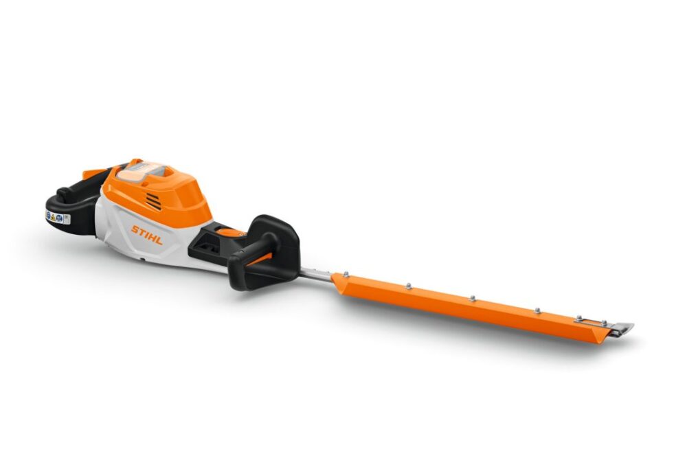 Elektrisk hækkeklipper med orange og hvidt design.