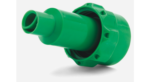 Grøn plastkomponent mod sort baggrund