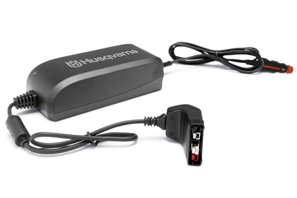 Husqvarna batterioplader med kabler