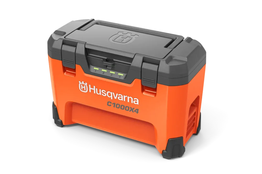 Orange Husqvarna batterioplader