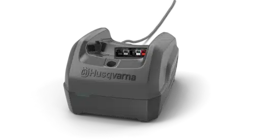Husqvarna oplader til haveredskaber.