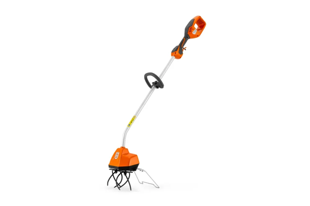 Elektrisk orange havefræser med håndtag