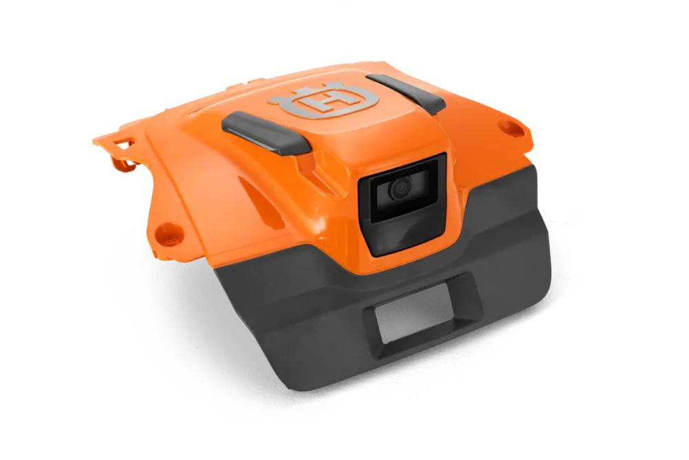Kamera på en orange Husqvarna robotklipper.